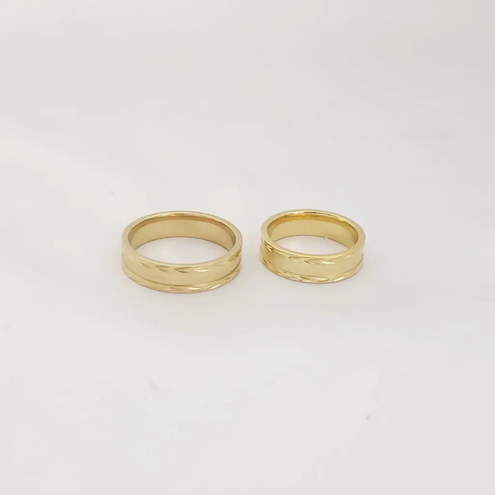 Par De Argollas De Matrimonio Con Diseño De Marcado Circular
